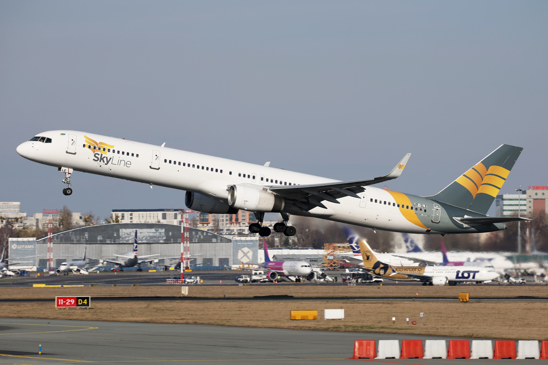 UR-SLE (Aircraft » EPWA Spotting » Boeing 757-300 » SkyLine Express Airline)