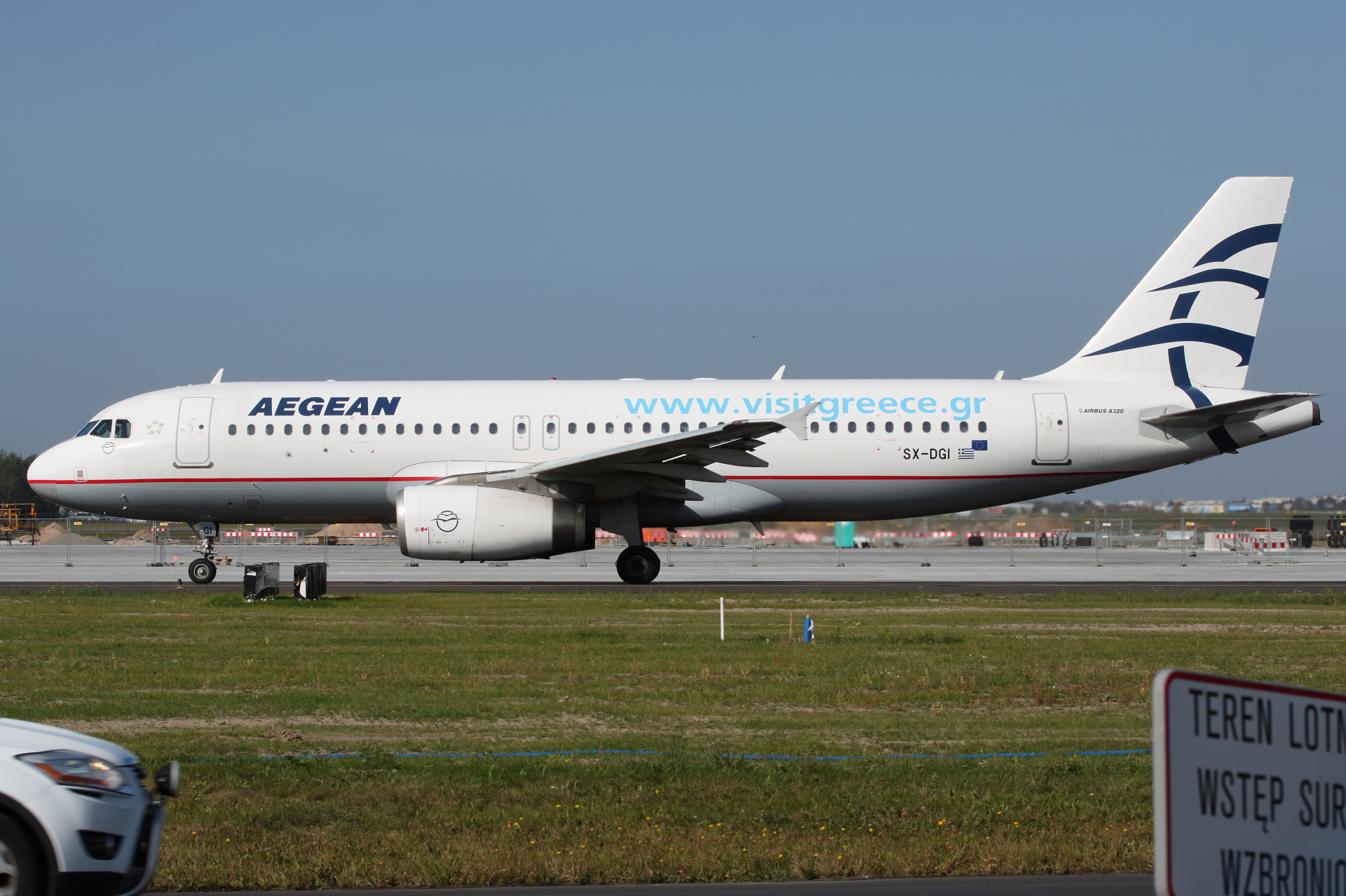 SX-DGI (malowanie Visit Grece) (Samoloty » Spotting na EPWA » Airbus A320-200 » Aegean Airlines)