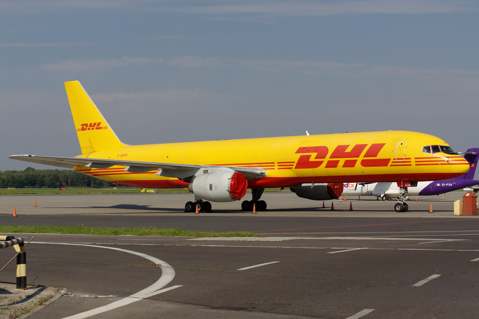 SF, G-BIKM, European Air Transport (Samoloty » Spotting na EPWA » Boeing 757-200F » DHL)