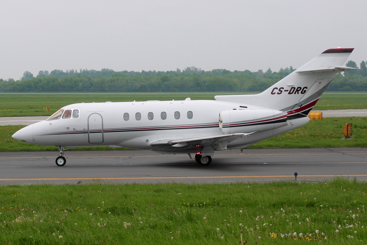 CS-DRG, NetJets Europe (Aircraft » EPWA Spotting » BAe 125 and revisions » Raytheon Hawker 800XP)