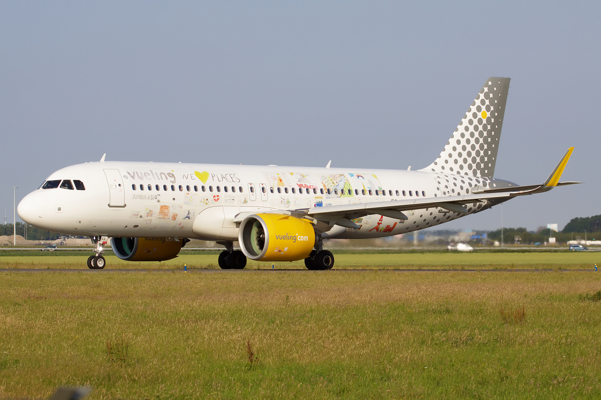 EC-NAJ (We Love Places livery) (Aircraft » Schiphol Spotting » Airbus A320neo » Vueling Airlines)