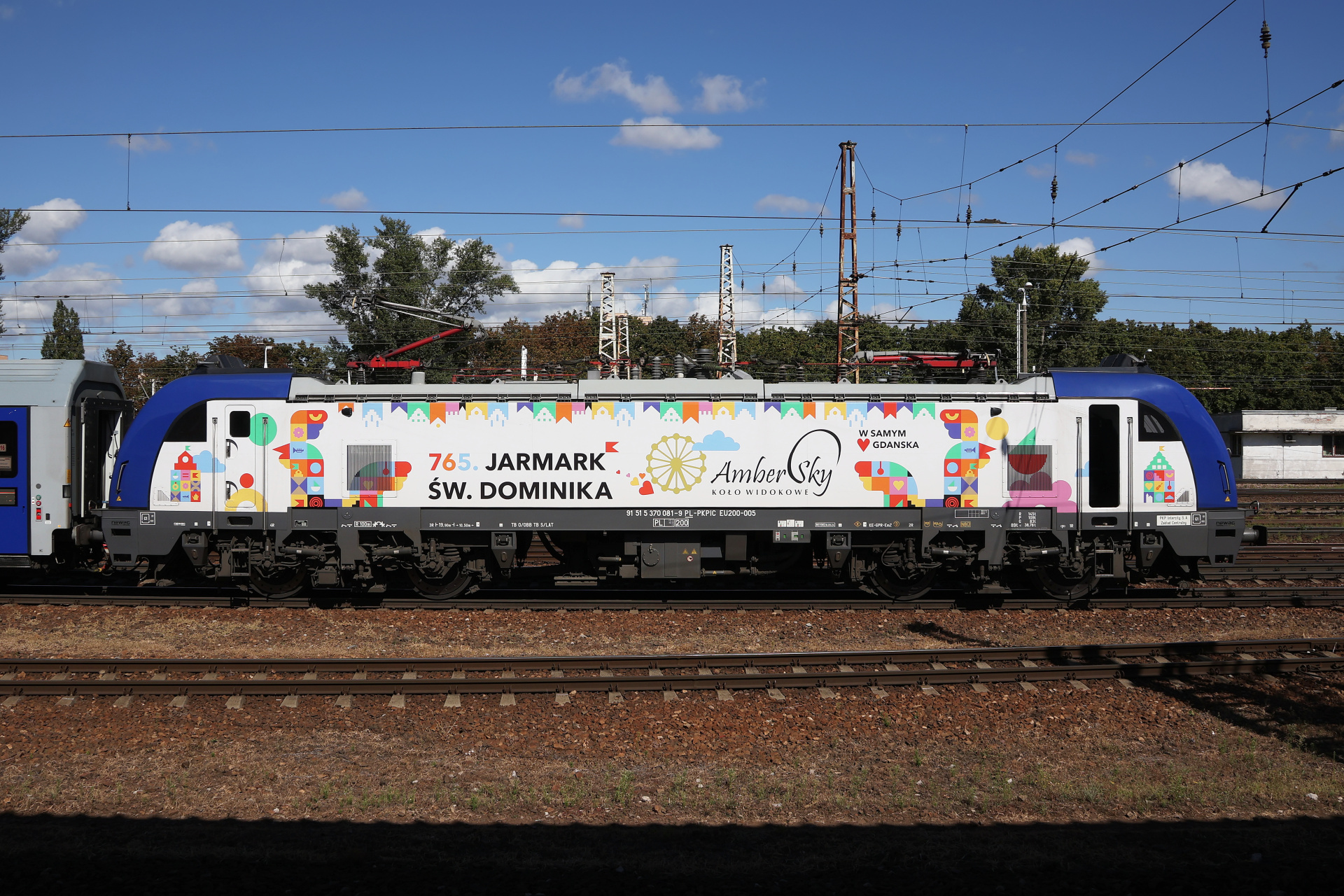 EU200-005 ("765. Jarmark św. Dominika/Amber Sky koło widokowe") (Pojazdy &raquo; Pociągi i lokomotywy &raquo; Newag Griffin &raquo; E4MSUa (Wielosystemowe), PKP Intercity)